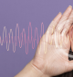Audiologist performing hearing test for diabetic patient in Bangladesh